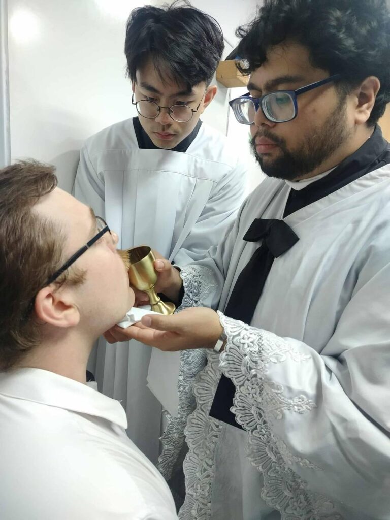 administering sacrament to jake